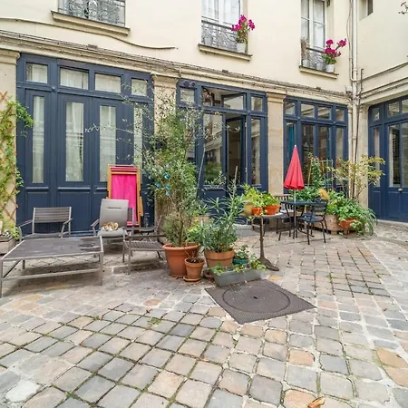 Guestready - Family Loft With Big Patio 3 Mins From Poissonnière Parigi